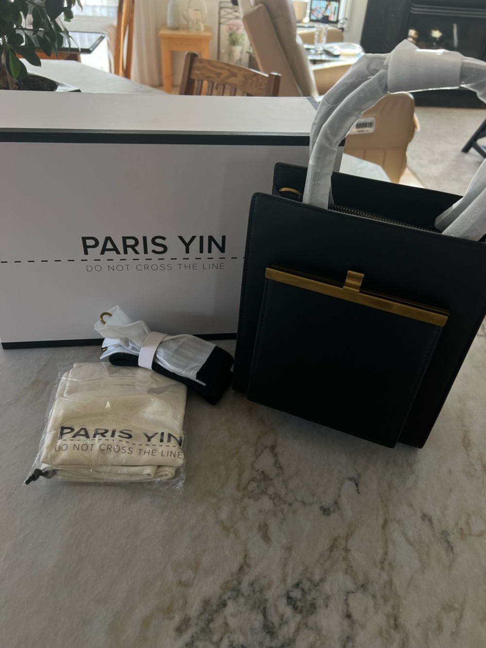 Black Mini Tote with Gold Accent. leather